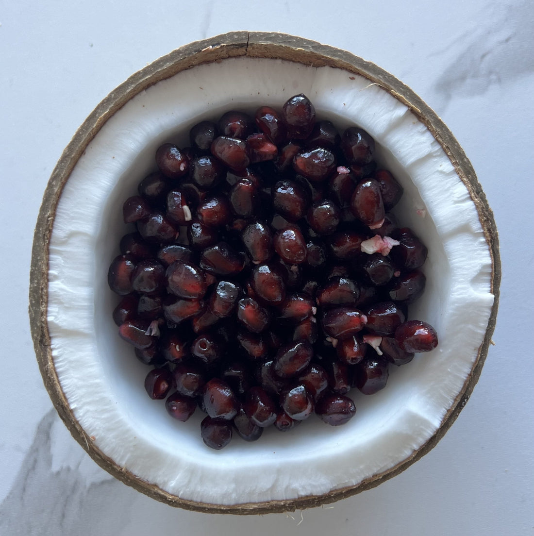 Hidden Benefits of Coconut and Pomegranates for Your Skin